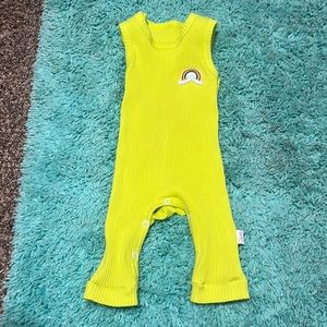 Light green stretch jumper with a rainbow 6-9